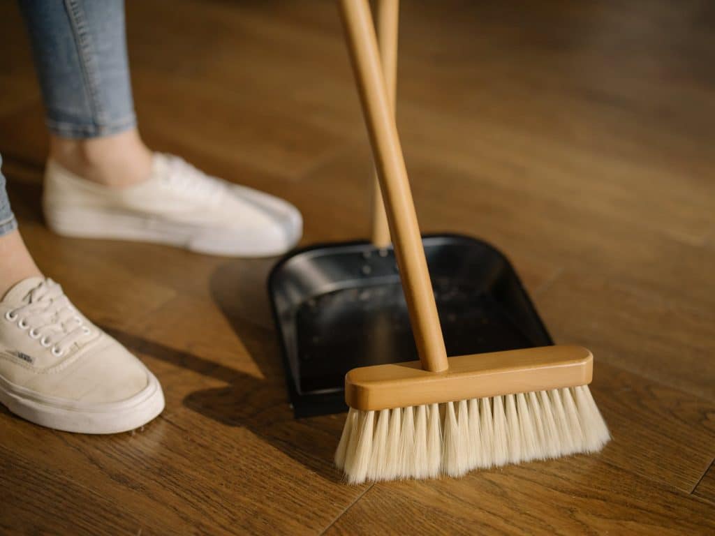 spring cleaning, sweeping the floor